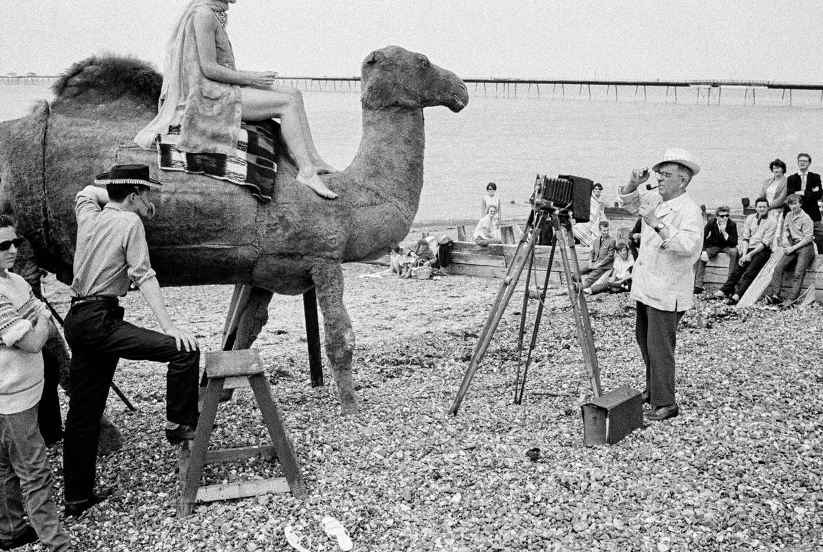 GB. ENGLAND. Herne Bay. Local portrait photographer on the beach. 1963.