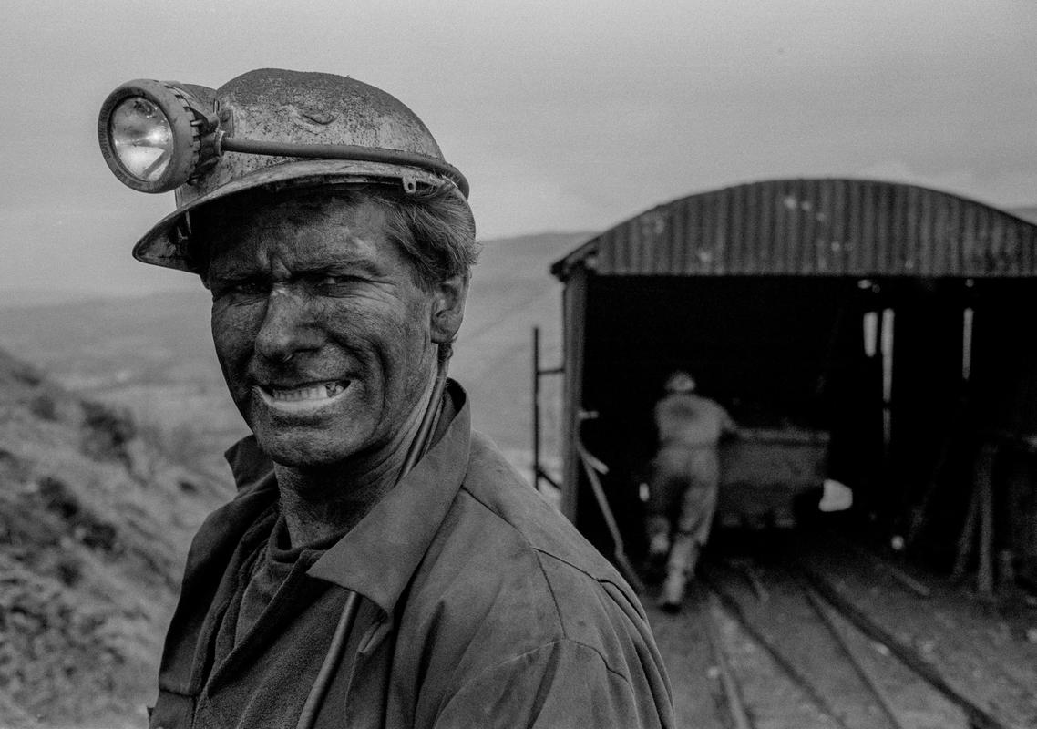 GB. WALES. Neath Valley. Black mountain coal. Miner after his shift, portrait. 1993