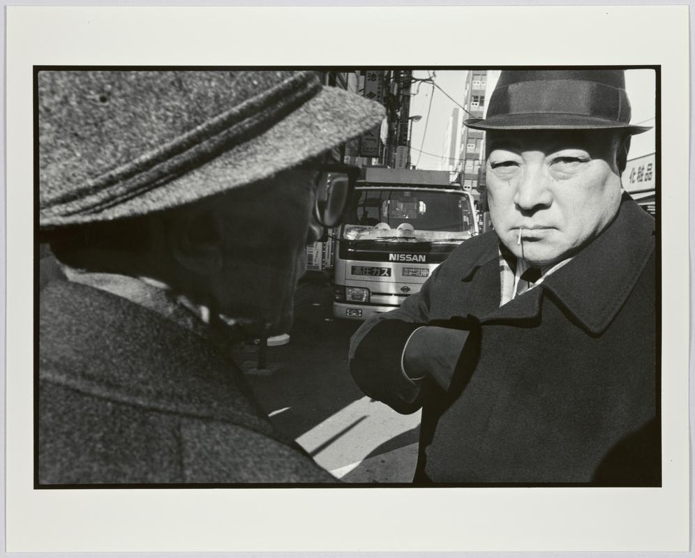 Business man at lunchtime outside JR station, Kaeda, Tokyo