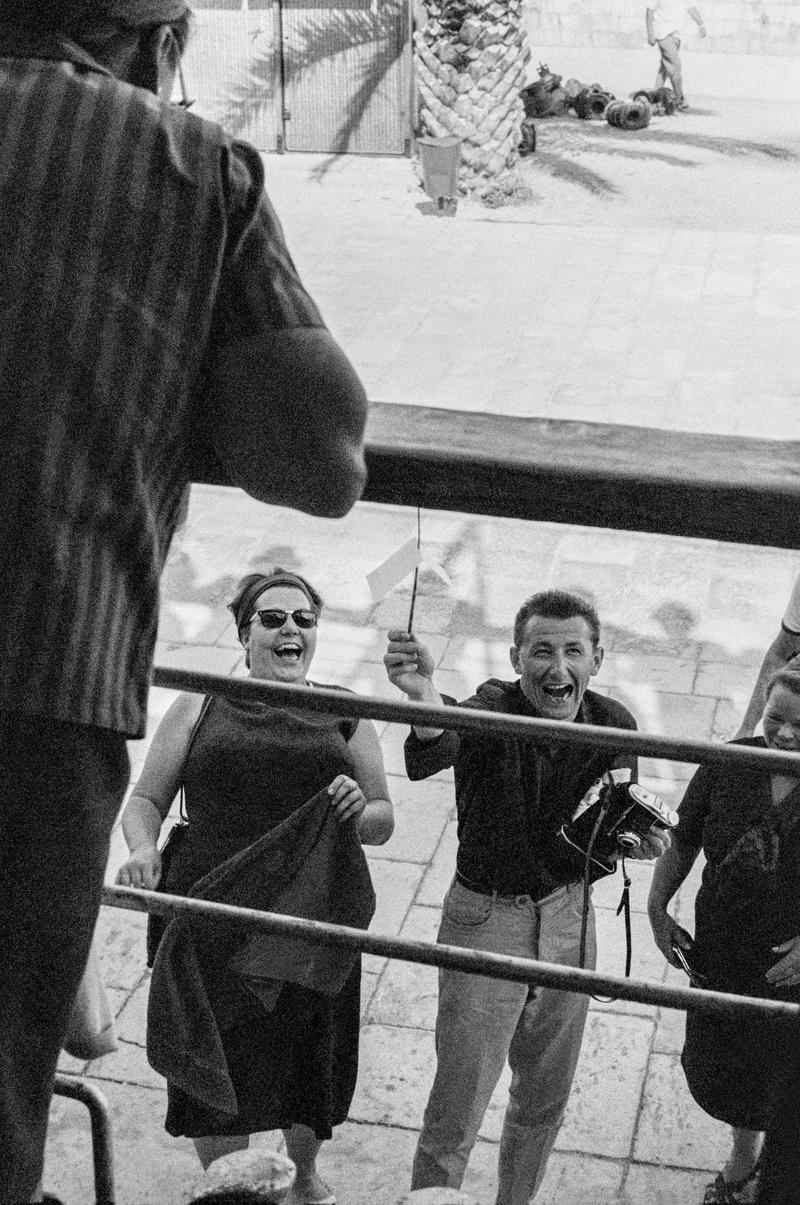 CROATIA (was Yugoslavia). Dubrovnik. Tourists on a boat, are seen off by friends, in the docks. 1964.