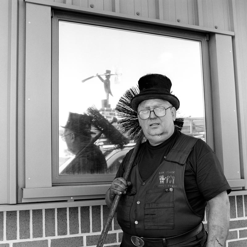 Ron Clark. Photo shot: Colomendy Estate, Denbigh, 12th August 2002. Place and date of birth: Denbigh 1943. Main occupation: Chimney Sweep. First language: English. Other languages: None. Lived in Wales: Always.