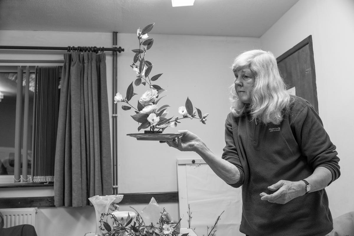 GB. WALES. Flower arranging demonstration. 2013.