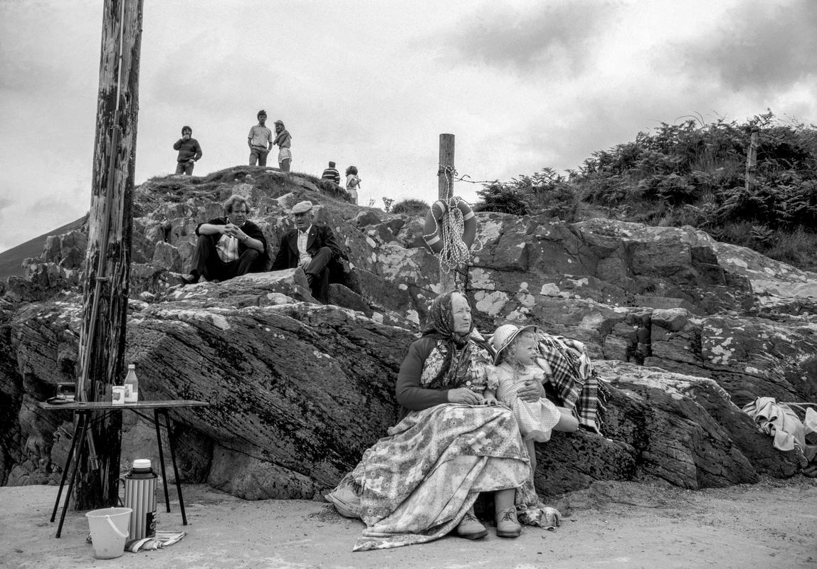 IRELAND. Slea Head. Perhaps the most beautiful coastline in Ireland. Locals spend an afternoon by the sea. 1984.