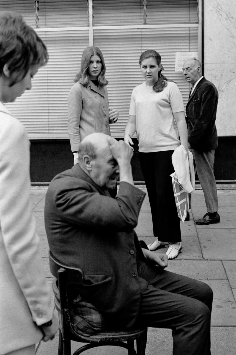 GB. ENGLAND. London. Queensway. Smash and grab raid on A B David jewellers and Silversmiths. Photographed when I was on my way to my ritual morning coffee. Published as a wrap around cover of the Sunday Mirror. 1969. (Image 7/8)