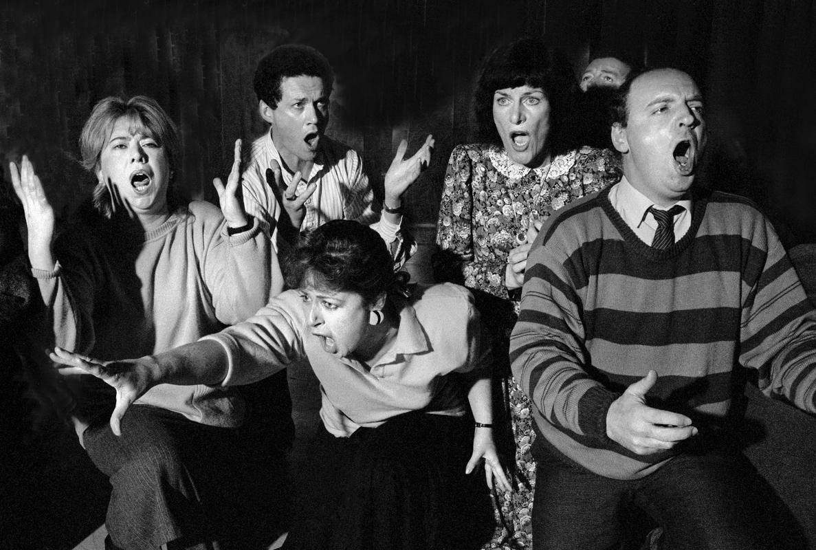 GB. WALES, Cardiff. Members of the chorus of the Welsh National Opera, considered one of the world's best choruses, at rehearsal. South Glamorgan. 1986.