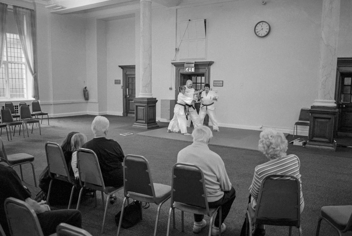 GB. WALES. Cardiff. Karate demonstration in the City Hall. 2004.