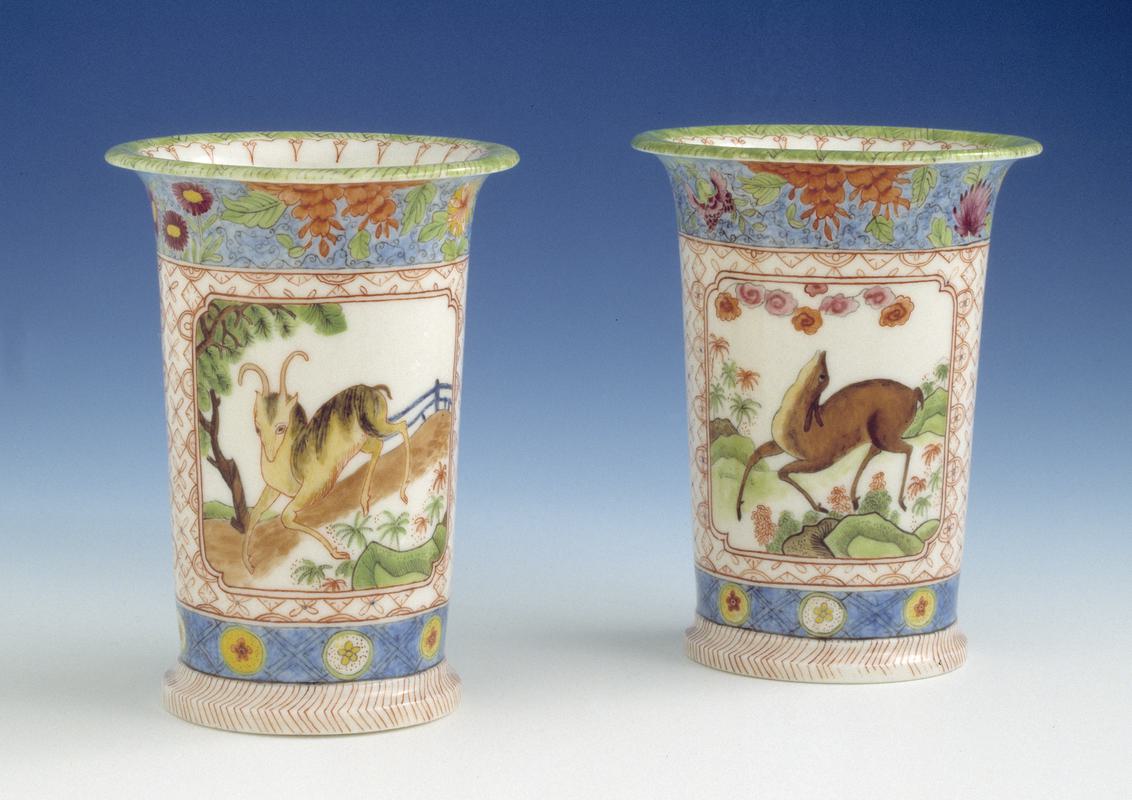 Documentery pair of spill vases