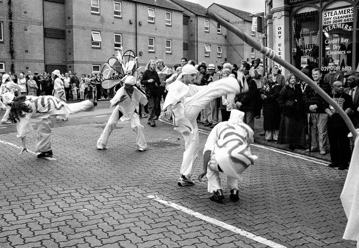 GB. WALES. Cardiff. Butetown - once know as 'Tiger Bay'. Carnival 2003 - Corner of James Street and West Bute Street. 2003.