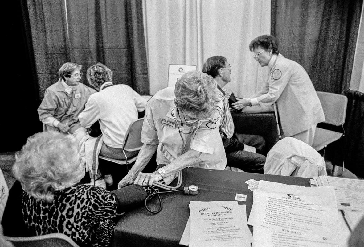 USA. ARIZONA. Phoenix. Free blood pressure tests at a Health care show. 1997.