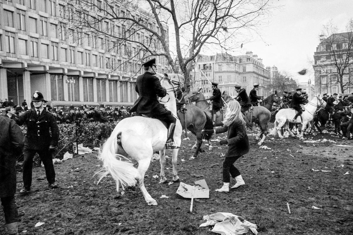 GB. ENGLAND. London. Trouble flared in Grosvenor Square, London, after an estimated 6,000 marchers faced up to police outside the United States Embassy. On March 17, an anti-war demonstration in Grosvenor Square, London, ended with 86 people injured and 200 demonstrators arrested. The protesters had broken away from another, bigger, march against US involvement in Vietnam but were confronted by a wall of police. 1968.