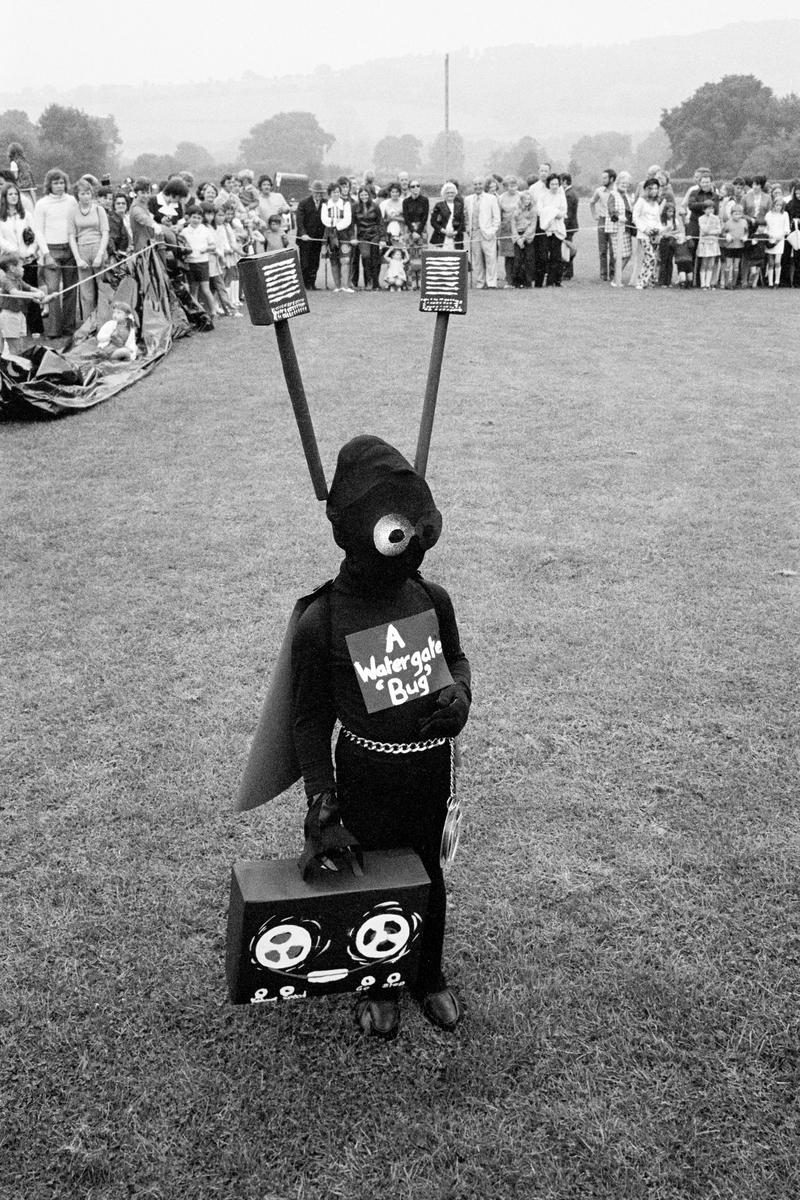 GB. WALES. Llangynidr Gala. Fancy dress competition just after the American Presidents Watergate  scandel. 1973.