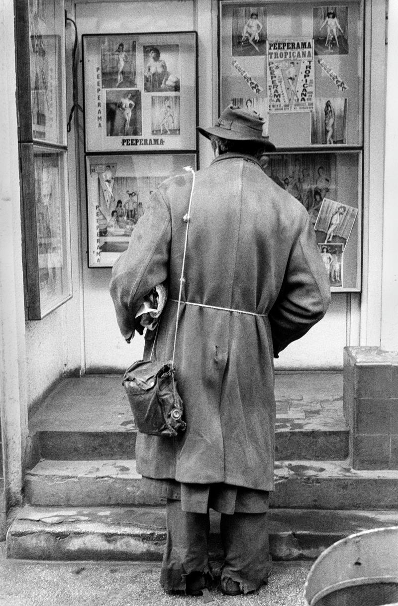 GB. ENGLAND. Soho. Down and out in London.  But they dont charge to look at the photographs.  Soho, London. Taken on a Contax 2 camera (first professional camera). 1958.