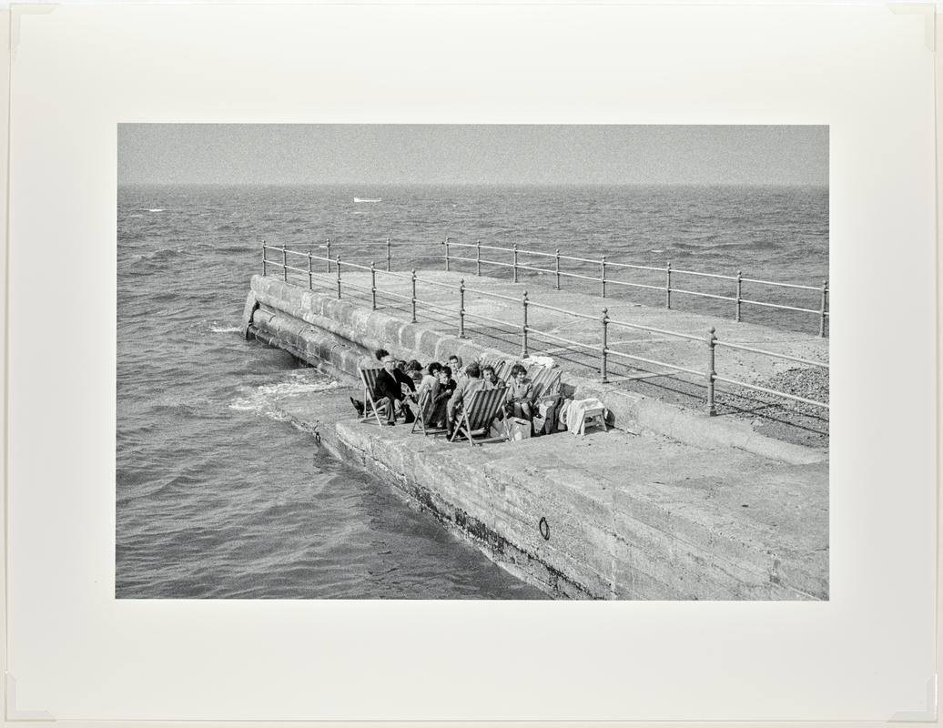 Herne Bay holiday makers determined to enjoy their holiday whatever the temperature or however high the wind. Herne Bay. England