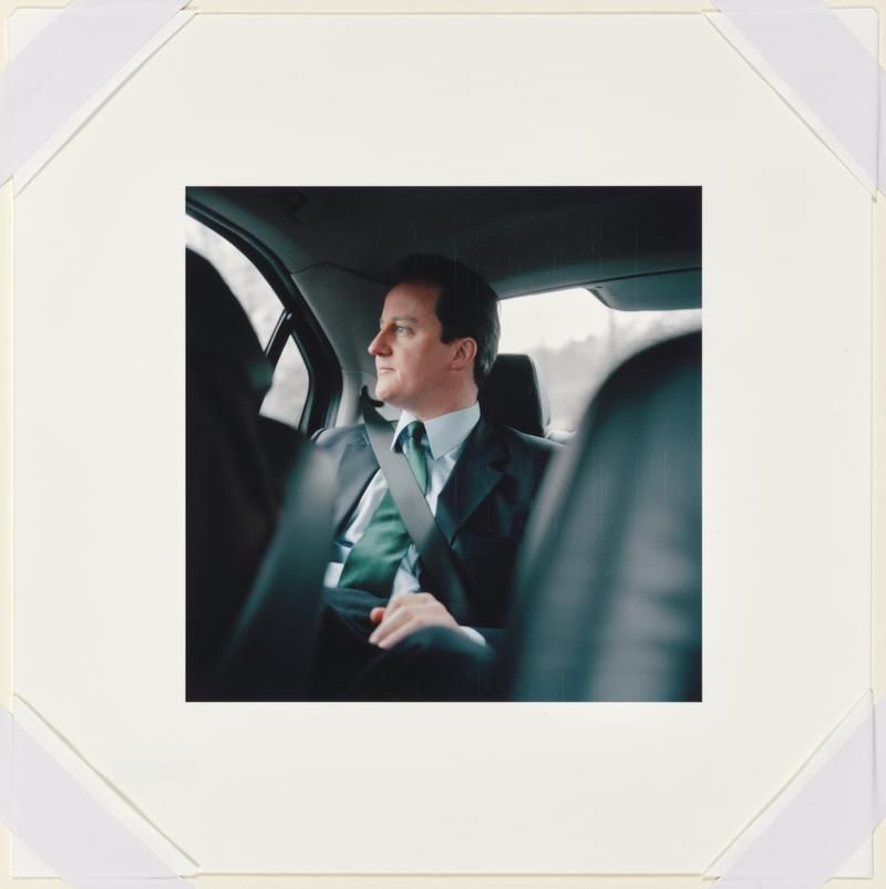 During a visit to the damaged Buncefield Oil Refinery in Hemel Hempstead. Cameron drives to meet local politicians