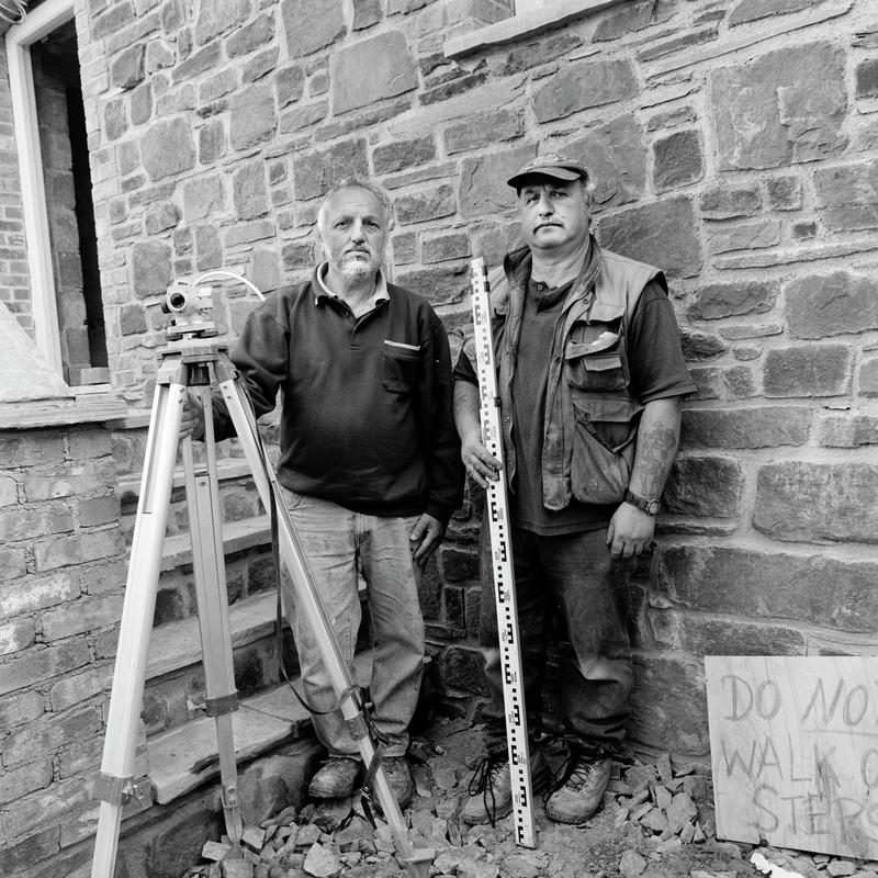 Domenico & Rafael Colella. Photo shot: Mathry, 30th September 2002. DOMENICO COLELLA - Place and date of birth: Calabria, Italy 1950. Main occupation: Master Builder. First language: English. Other languages: Italian. Lived in Wales: Since 1955. RAFAEL COLELLA - Place and date of birth: Calabria, Italy 1953. Main occupation: Master builder. First language: English. other languages: Italian. Lived in Wales: Since 1955.