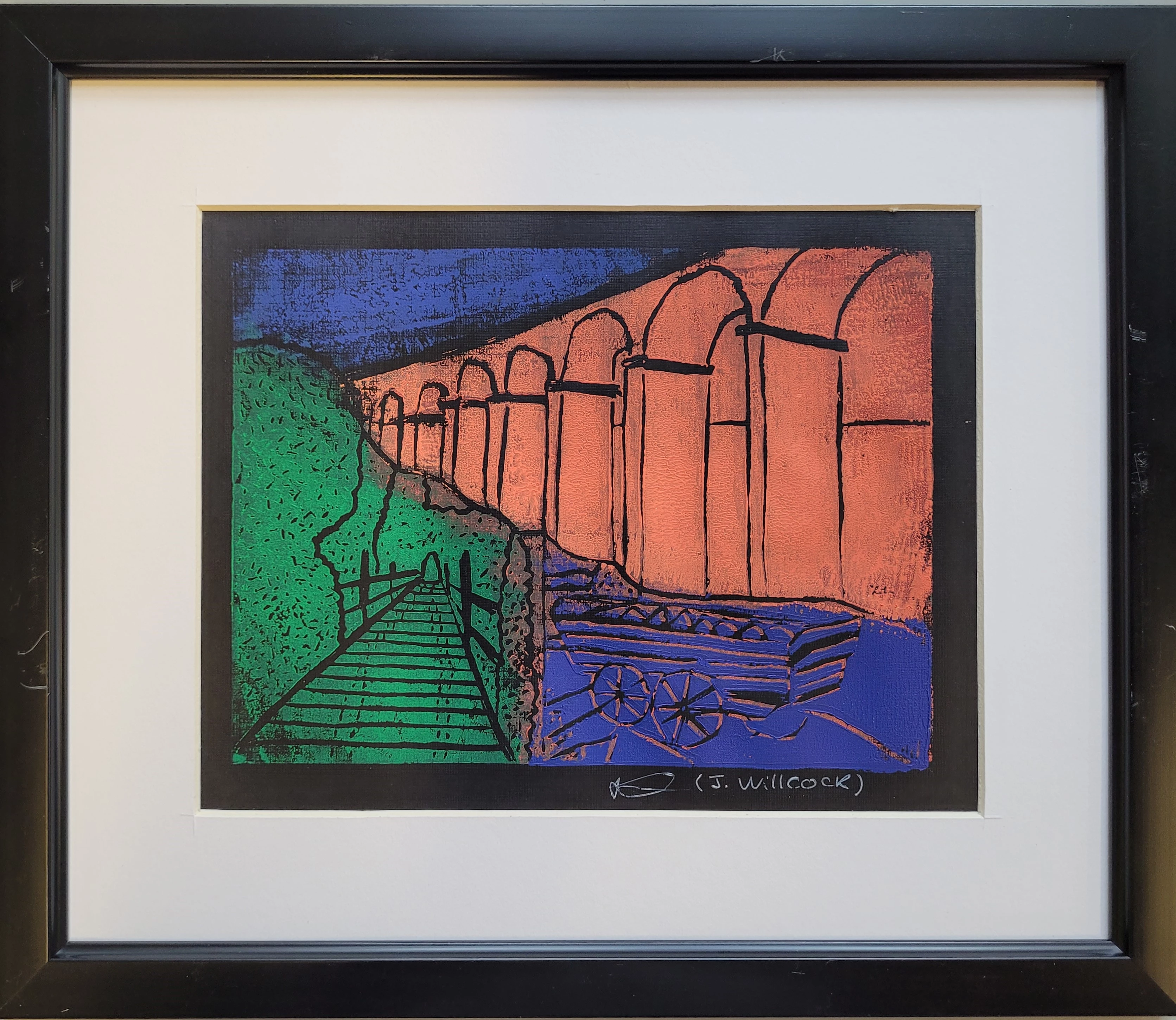 Print leino o draphont gyda chert mewn 3 lliw cryf: gwyrdd, glas ac oren. Y draphont sy'n oren.
